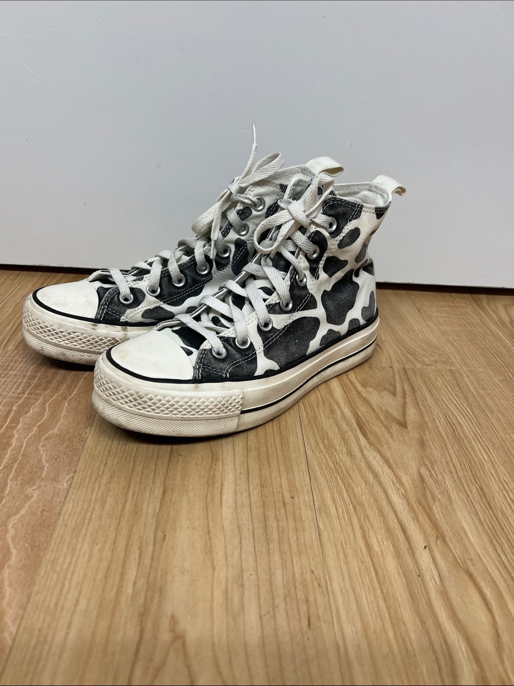 High-Top Canvas Sneakers in Black & White Cow Print